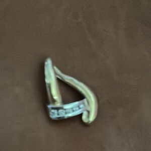 Elegant Gold and Silver Women's slide with diamonds. The diamonds are visible.